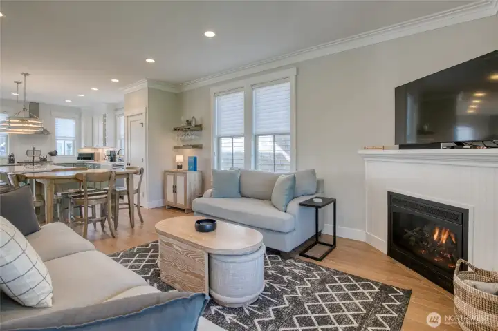 The open concept living space is gracious and full of natural light. The propane fireplace will keep you cozy all year long.