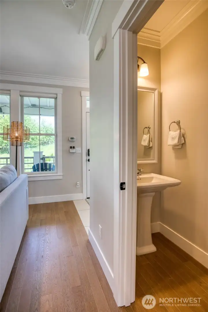 Off the living space is a main floor powder bath.