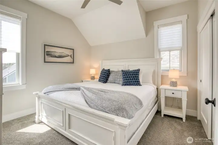 Bedroom number two is large and filled with natural light.