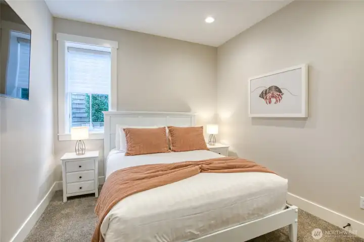 The lower level offers another bedroom or could be used as a media room.