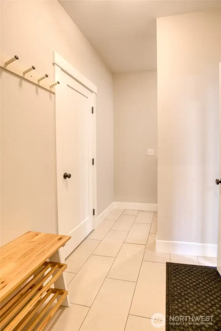 The lower level has access to the garage and alley.