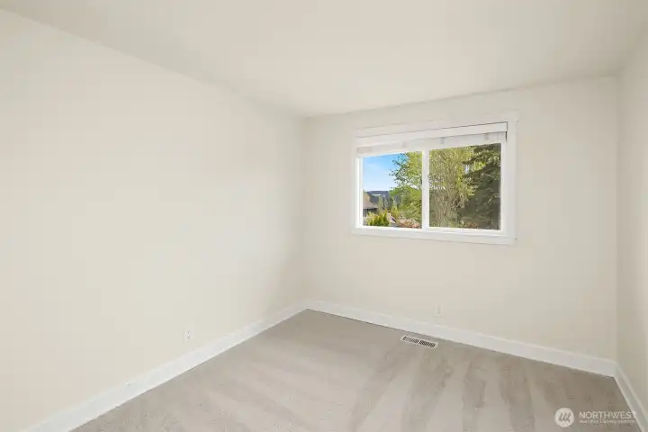 Third bedroom. All bedrooms are nicely sized. New paint and carpet.