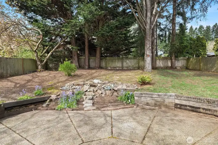 Enjoy the expansive backyard with a beautiful patio—perfect for entertaining, hosting big BBQs, or simply lounging and relaxing outdoors.