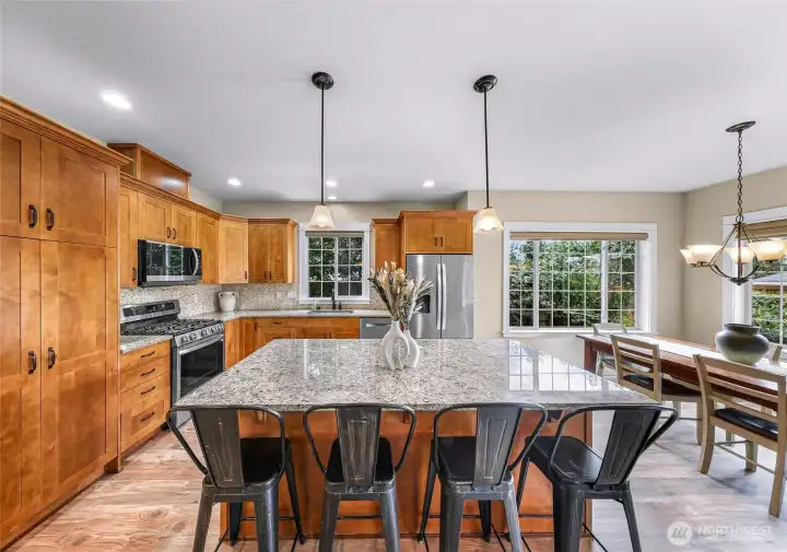 Massive granite kitchen island with seating for 4...