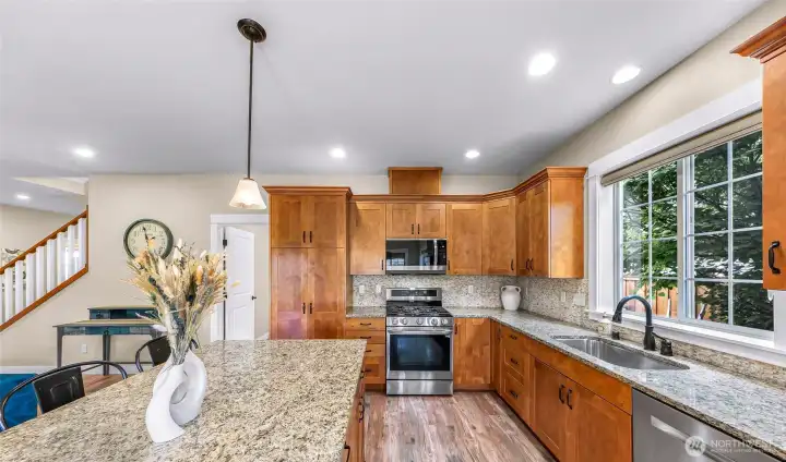Granite countertops and stainless steel appliances