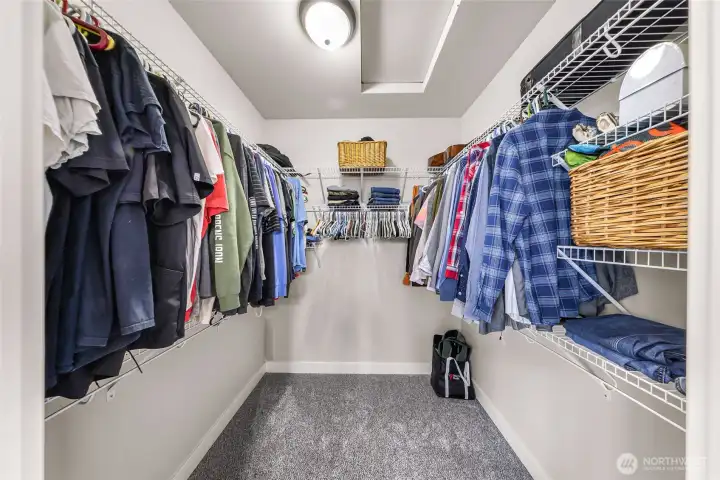 Spacious walk-in closet in primary bedroom suite