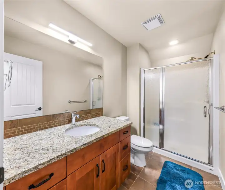 Second floor bathroom with large shower
