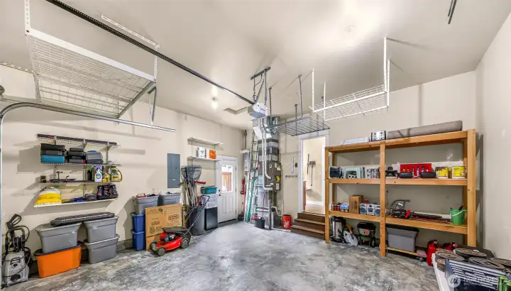 Two car garage with plenty of room for storage or a workbench
