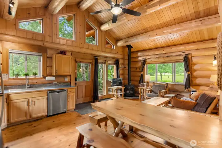 Propane stove anchors the great room with inviting ambiance. Propane stove anchors the great room with inviting ambiance.