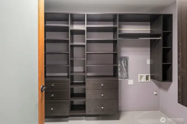 Huge closet with built-ins and washer/dryer hook ups.