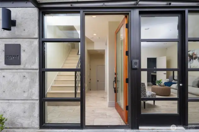 Front door looks through home to garage access in the back.