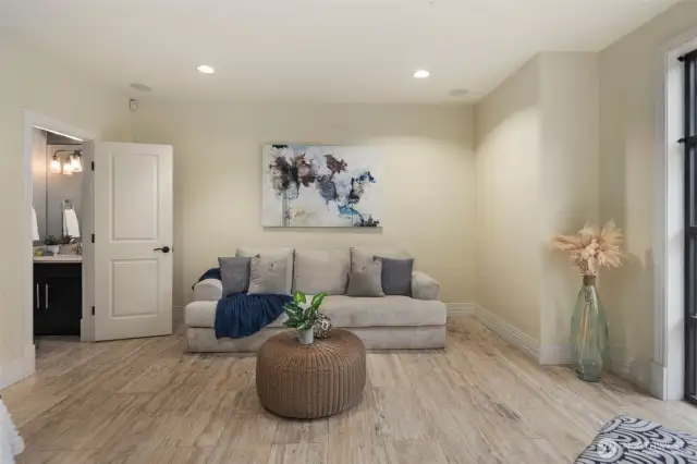 Versatile entry level bedroom can be an office, bedroom, or bonus room.