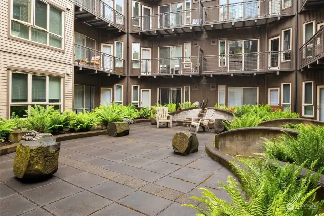 Unwind in this charming courtyard, complete with a soothing water feature!