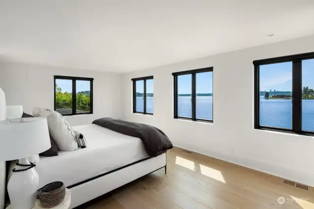 Second floor offers two large guest suite bedrooms with attached bathrooms and large walk in closets. This one capturing the mesmerizing views.