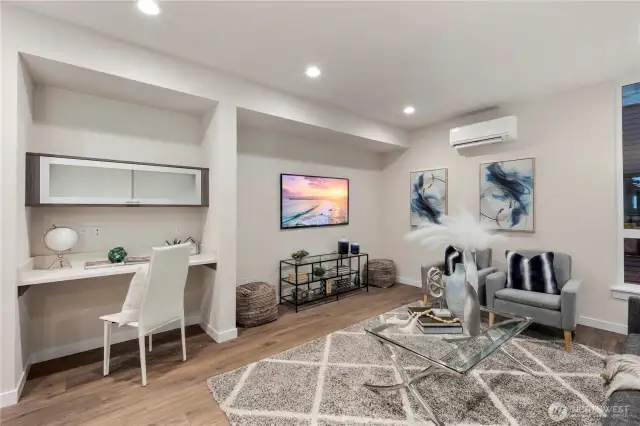 Very large living rooms.  Not your typical skinny townhome. Living rooms have work from home areas and is ready for all your media.