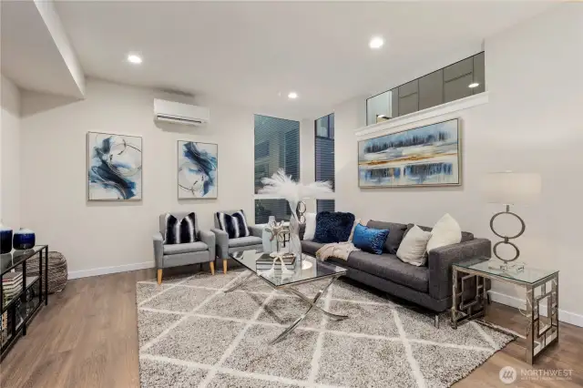 Very large living rooms.  Not your typical skinny townhome. Living rooms have work from home areas and is ready for all your media.