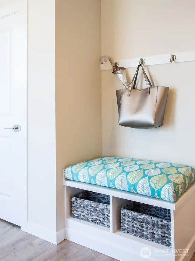Entry level foyer complete with built in bench and storage plus large entry closet. This is an actual foyer entry instead of walking into a living room as your entry.