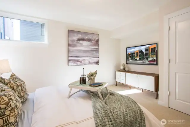 VERY large main level bedroom.  Perfect as an office, MIL area, Media room, etc.  This bedroom is on the entry level with its own bathroom.