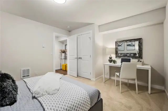 VERY large main level bedroom.  Perfect as an office, MIL area, Media room, etc.  This bedroom is on the entry level with its own bathroom.