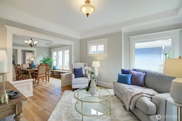 New flooring on a 3 levels. Bright and spacious living and dining rooms. New double pane windows. Coved ceilings.