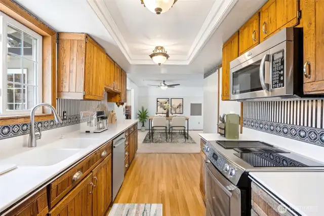 Kitchen with Lots of Counterspace and Window Overlooking Your Outdoor Entertaining Area.
