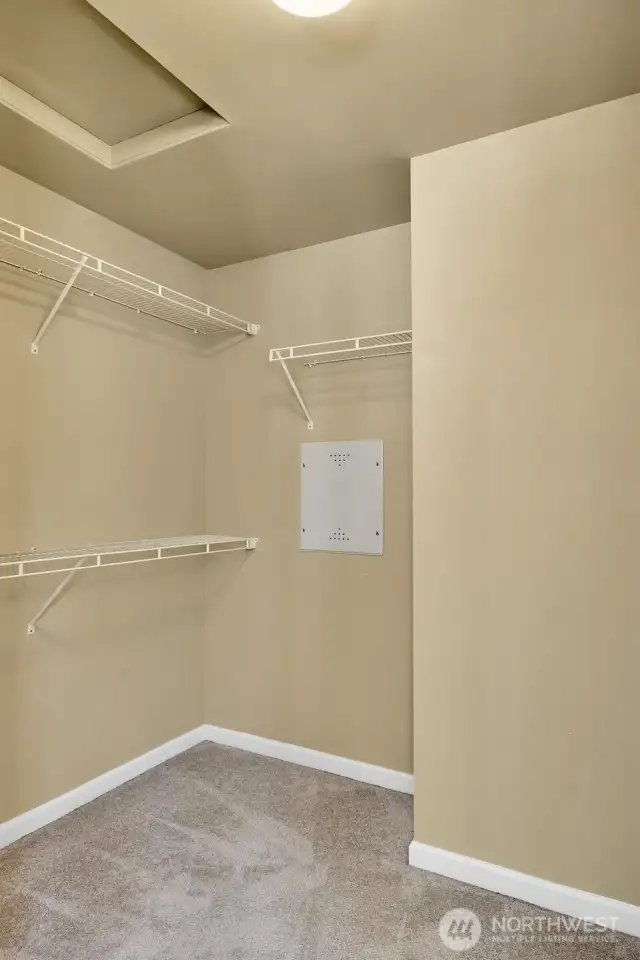 Primary walk-in closet.