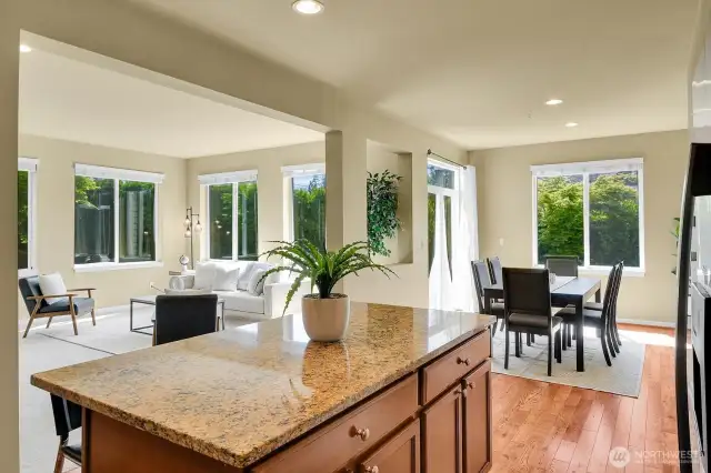 Open-concept living featuring abundant natural light from expansive windows!