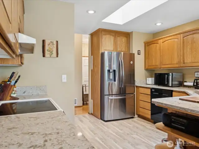 Quartz countertop and skylights in the upstairs kitchen.