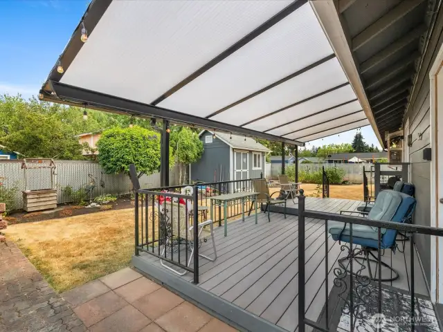 Large covered Trex Deck off the Dining - opens to large beautiful Fenced Yard & Patio.