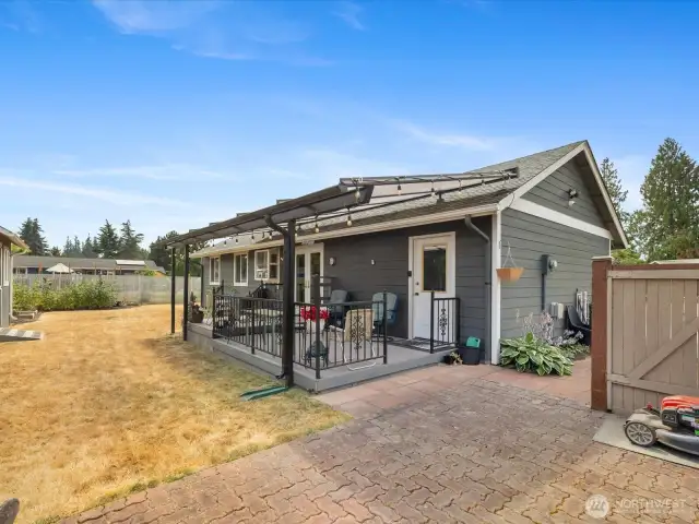 Large covered Trex Deck off the Dining - opens to large beautiful Fenced Yard & Patio.