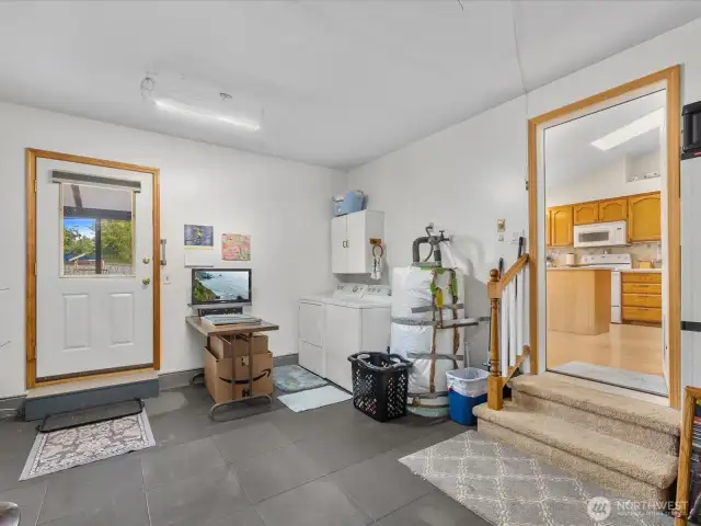 Garage is wide open space with Door to Backyard.