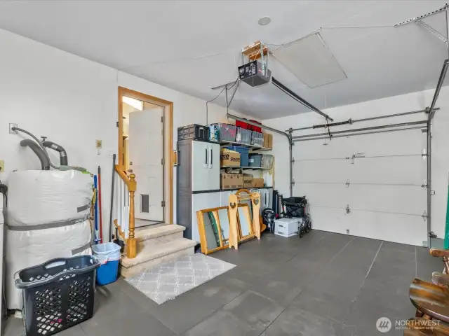 Garage is wide open space with Door to Backyard.