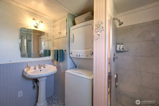 Completely updated bathroom and laundry room. Check out the newly tiled shower.