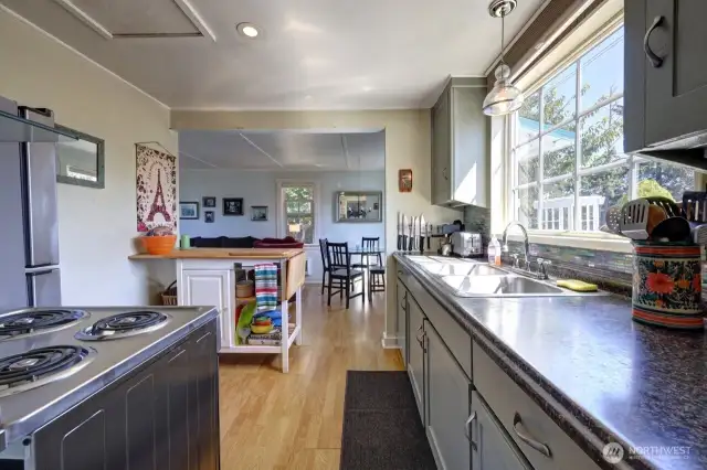Kitchen with all stainless appliances looking towards the dining room