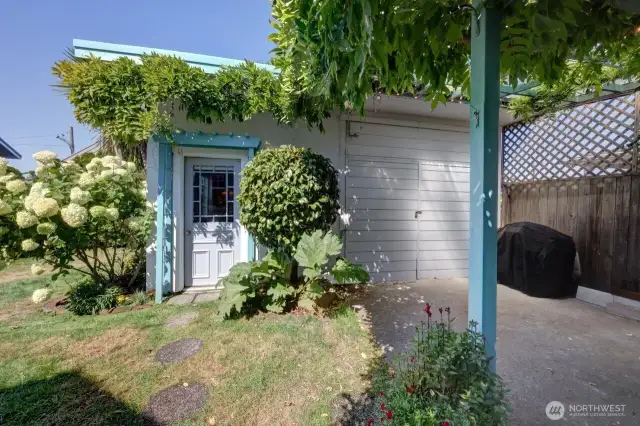 Entrance to the extra sleeping room and garage/workshop
