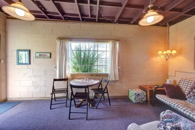 Extra sleeping room/hobby room/Office you decide. There is plumbing for a potential bathroom.