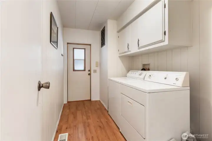The utility room which leads out into the carport