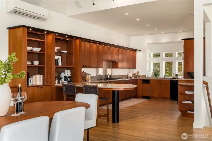 The custom cabinetry is everywhere throughout this house complete with accent lighting.
