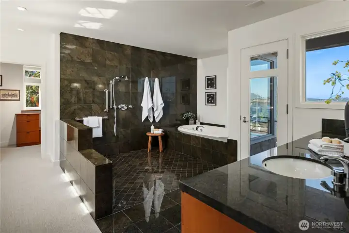 Just off the king sized bedroom is this bathroom. Massive is an understatement. A separate water closet is off to the left and a view deck is off to the right.