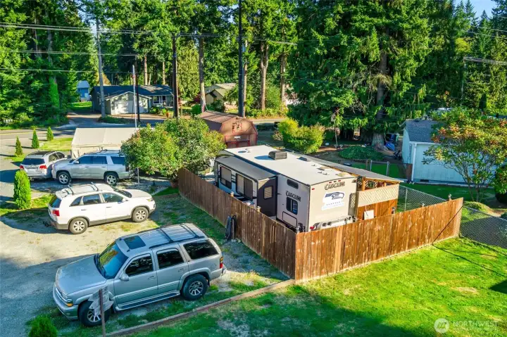 Unit C is full RV hook up with separate electrical meter, cedar fencing, carport, shed and hot-tub and awning off RV belong to the tenant.