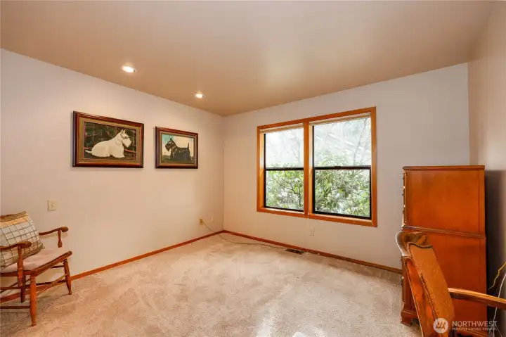 Second bedroom has window looking towards front of home.