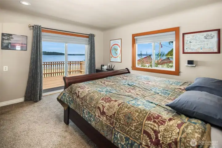 One of two bedrooms. Large slider door steps out to the deck where you can sleep to ocean sounds and wake to morning views.
