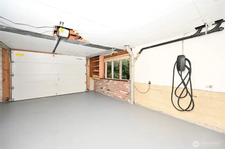 Attached 1-car garage has a Level 2 Tesla charger.