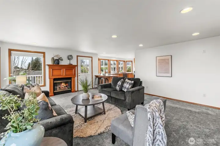 Easy to entertain with living area just off kitchen.