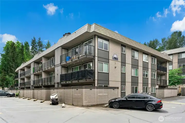 Exterior rear elevation | 3 floor building | Condo located on 1st floor corner