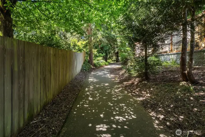 Go for a stroll right from your backyard! Trails lead to parks and schools.