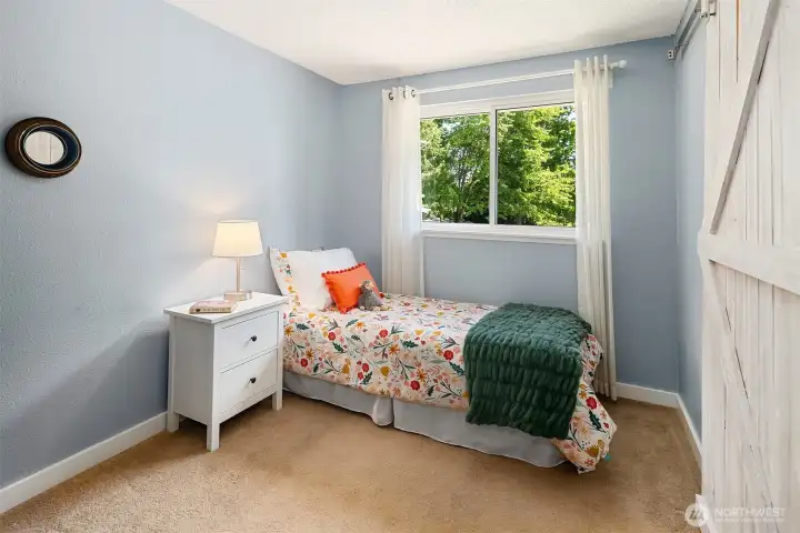 One of three main floor bedrooms