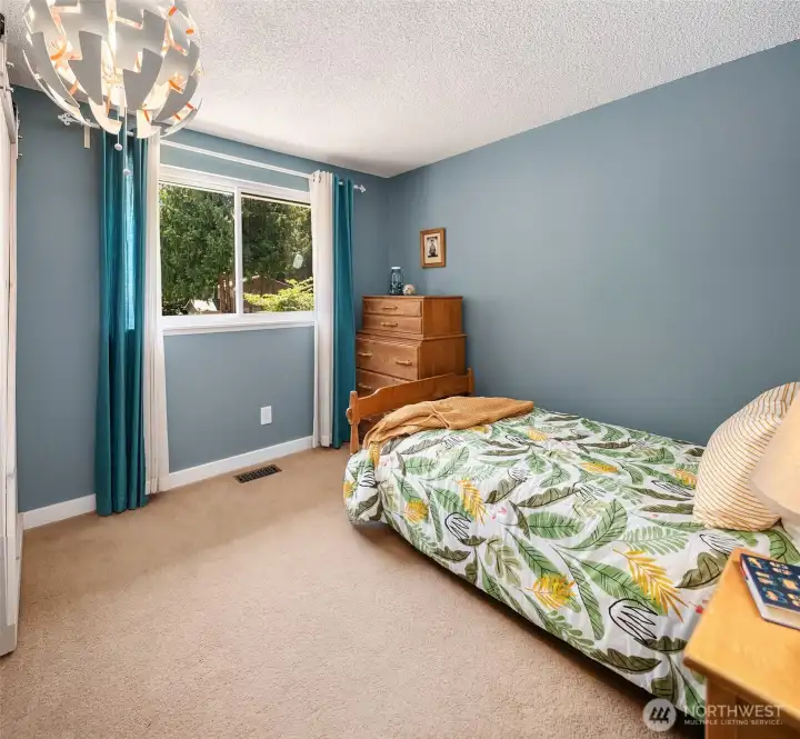 One of three main floor bedrooms