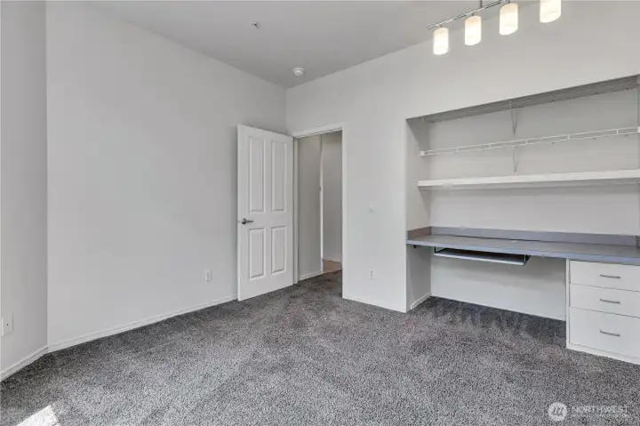 Secondary bedroom. Can easily be converted back to a closet as doors are in garage. Secondary bedroom. Can easily be converted back to a closet as doors are in garage.