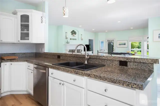 View from Kitchen sink with granite countertops
